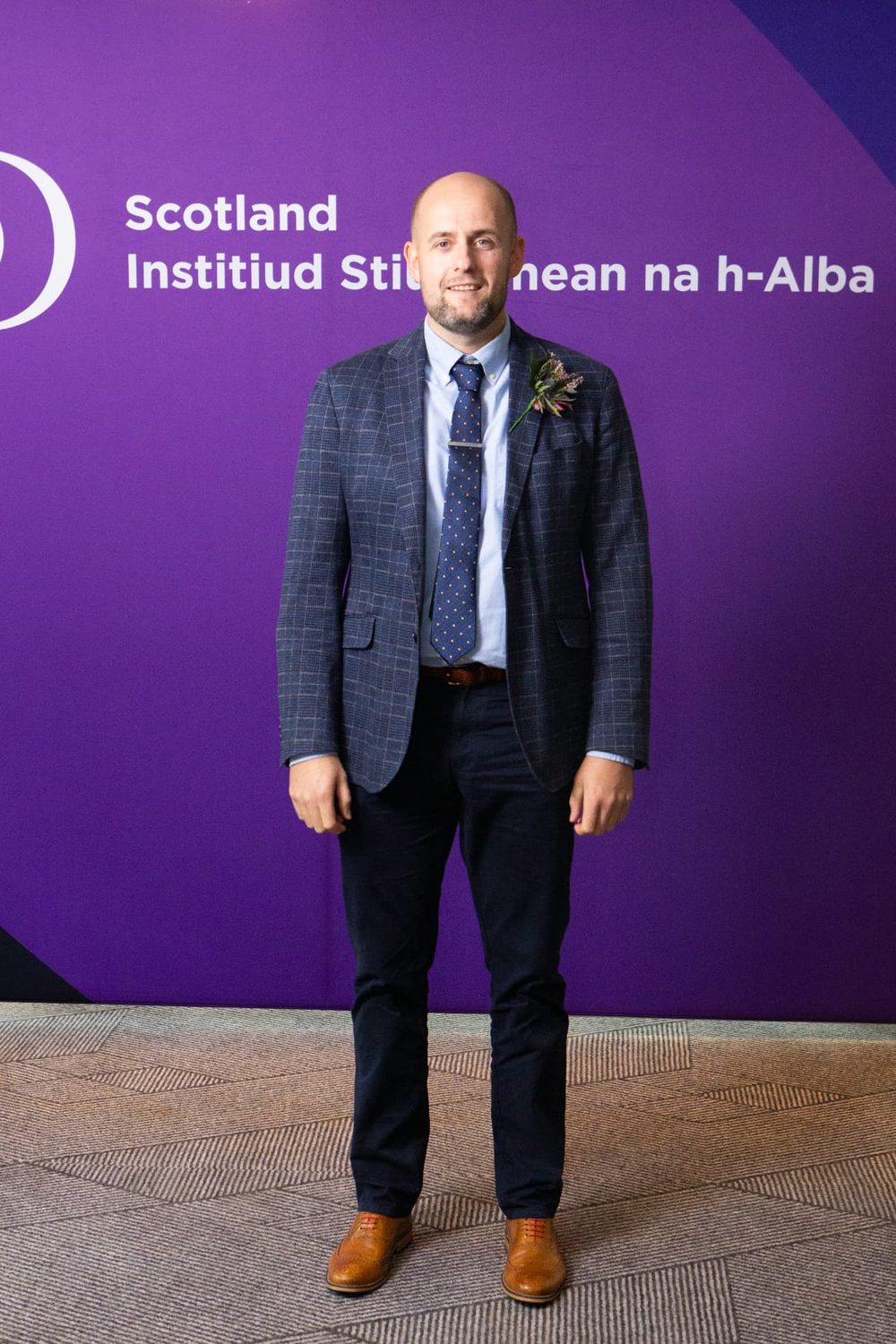 Lee Fitzpatrick at the Institute of Directors Scotland awards, in a check blazer