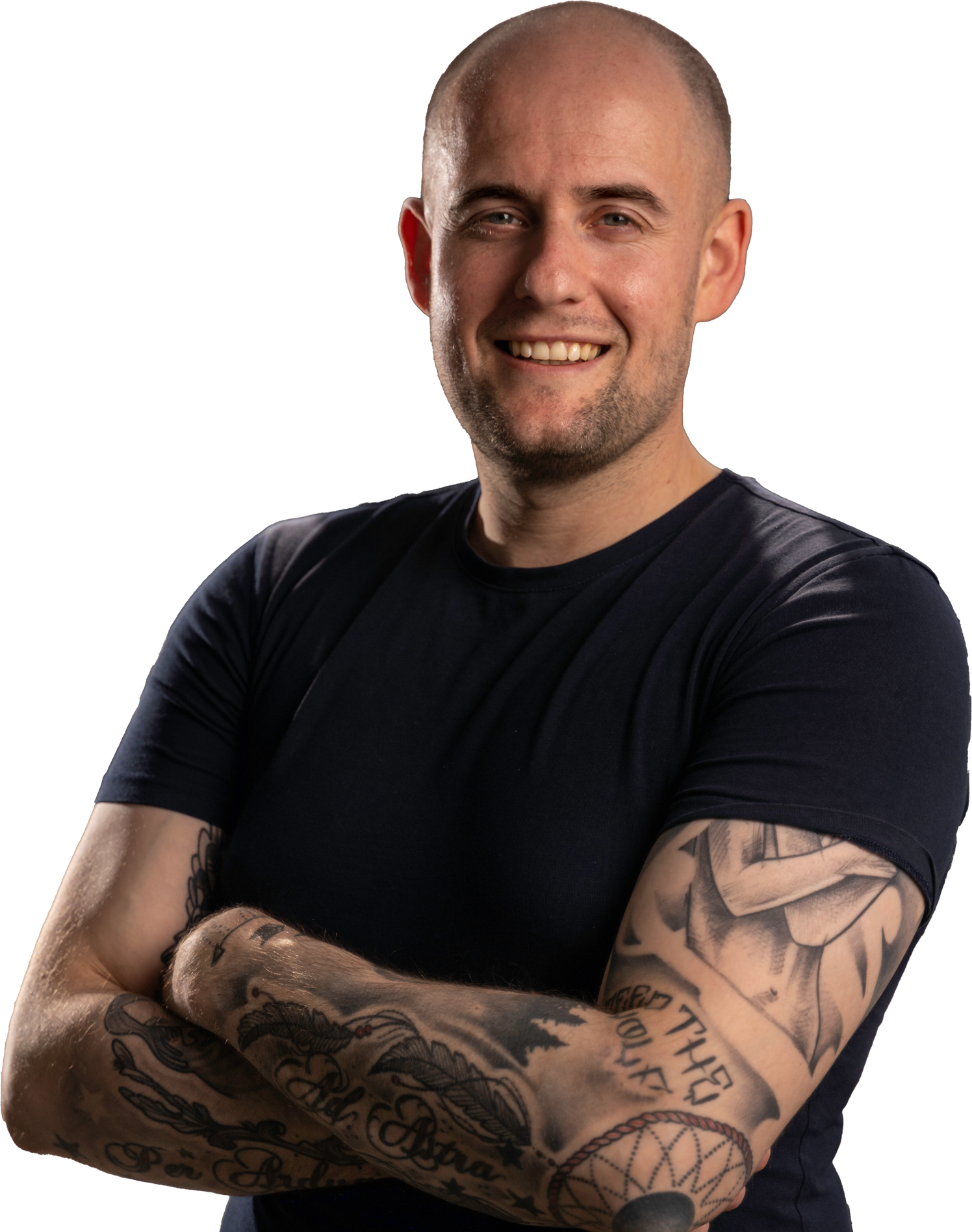 Lee Fitzpatrick, smiling with arms crossed